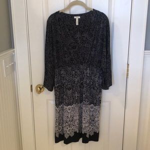 Black dress with white floral pattern details